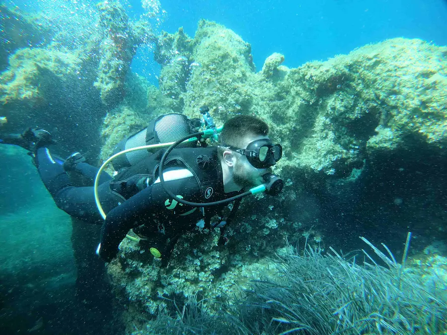 Alex Moudatsos underwater during a SCUBA dive